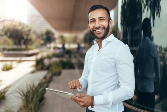 A business professional considering his masters degree options.