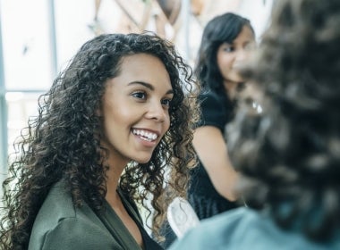 A smiling businessperson.